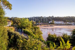 Rare south coast property overlooking prestigious bay