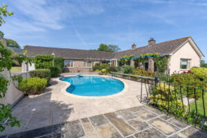 Detached Bungalow Offering Space And Privacy Within An Extensive Plot