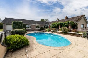 Detached Bungalow Offering Space And Privacy Within An Extensive Plot