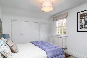 AN IMPRESSIVE FAMILY HOME WITH EXTENSIVE GROUNDS, POOL, AND TENNIS COURT