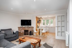 AN IMPRESSIVE FAMILY HOME WITH EXTENSIVE GROUNDS, POOL, AND TENNIS COURT