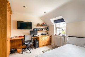 AN IMPRESSIVE FAMILY HOME WITH EXTENSIVE GROUNDS, POOL, AND TENNIS COURT