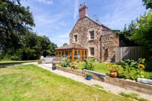Extended And Renovated Granite Farmhouse