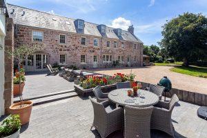 Extended And Renovated Granite Farmhouse
