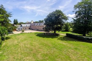 Extended And Renovated Granite Farmhouse