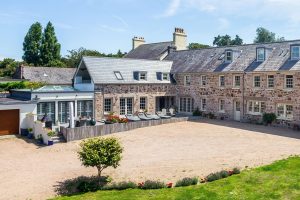 Extended And Renovated Granite Farmhouse