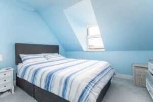 Bright Two-Bedroom Top Floor Apartment