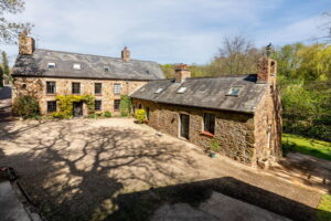 A Hidden Granite Farmhouse of Character, Privacy and Unexpected Space