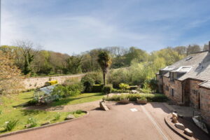 A Hidden Granite Farmhouse of Character, Privacy and Unexpected Space