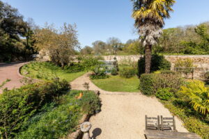 A Hidden Granite Farmhouse of Character, Privacy and Unexpected Space