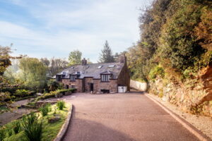 A Hidden Granite Farmhouse of Character, Privacy and Unexpected Space