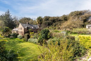 A Hidden Granite Farmhouse of Character, Privacy and Unexpected Space