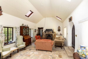 A Hidden Granite Farmhouse of Character, Privacy and Unexpected Space