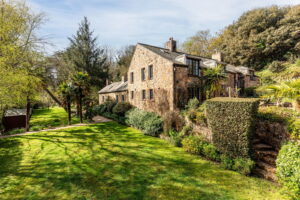 A Hidden Granite Farmhouse of Character, Privacy and Unexpected Space