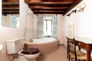 A Hidden Granite Farmhouse of Character, Privacy and Unexpected Space