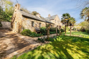 A Hidden Granite Farmhouse of Character, Privacy and Unexpected Space