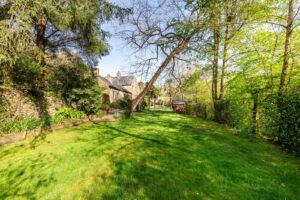 A Hidden Granite Farmhouse of Character, Privacy and Unexpected Space