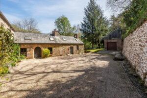 A Hidden Granite Farmhouse of Character, Privacy and Unexpected Space