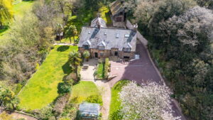 A Hidden Granite Farmhouse of Character, Privacy and Unexpected Space