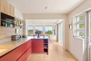Elevated Coastal Living with Panoramic Valley and Sea Views