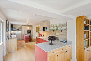Elevated Coastal Living with Panoramic Valley and Sea Views