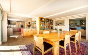 Elevated Coastal Living with Panoramic Valley and Sea Views