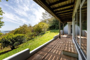 Elevated Coastal Living with Panoramic Valley and Sea Views