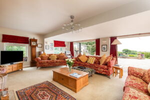 Exceptional Family Home with Indoor Pool, Beautiful Grounds and Views Towards France