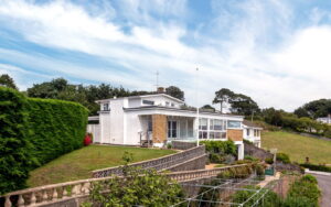 Elevated Coastal Residence with Panoramic Views and Exceptional Potential