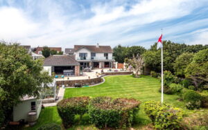 Exceptional Family Home with Indoor Pool, Beautiful Grounds and Views Towards France