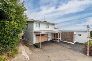 Elevated Coastal Residence with Panoramic Views and Exceptional Potential