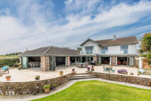 Exceptional Family Home with Indoor Pool, Beautiful Grounds and Views Towards France