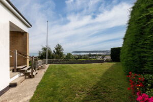 Elevated Coastal Residence with Panoramic Views and Exceptional Potential