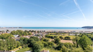 Elevated Coastal Residence with Panoramic Views and Exceptional Potential
