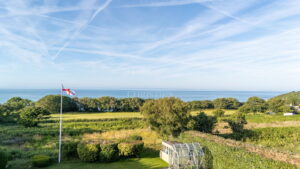 Exceptional Family Home with Indoor Pool, Beautiful Grounds and Views Towards France