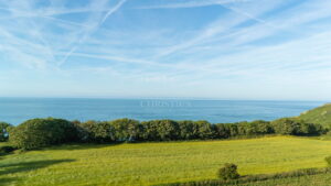 Exceptional Family Home with Indoor Pool, Beautiful Grounds and Views Towards France