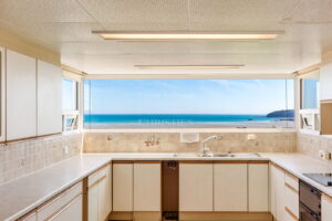 Elevated Coastal Residence with Panoramic Views and Exceptional Potential