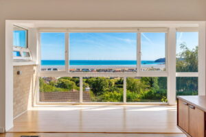 Elevated Coastal Residence with Panoramic Views and Exceptional Potential