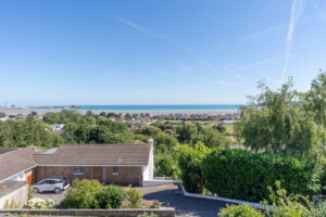 Elevated Coastal Residence with Panoramic Views and Exceptional Potential