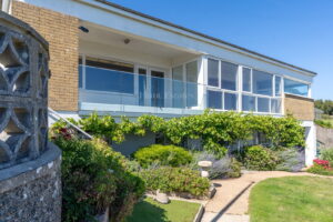 Elevated Coastal Residence with Panoramic Views and Exceptional Potential
