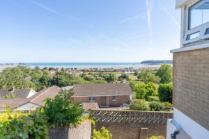 Elevated Coastal Residence with Panoramic Views and Exceptional Potential